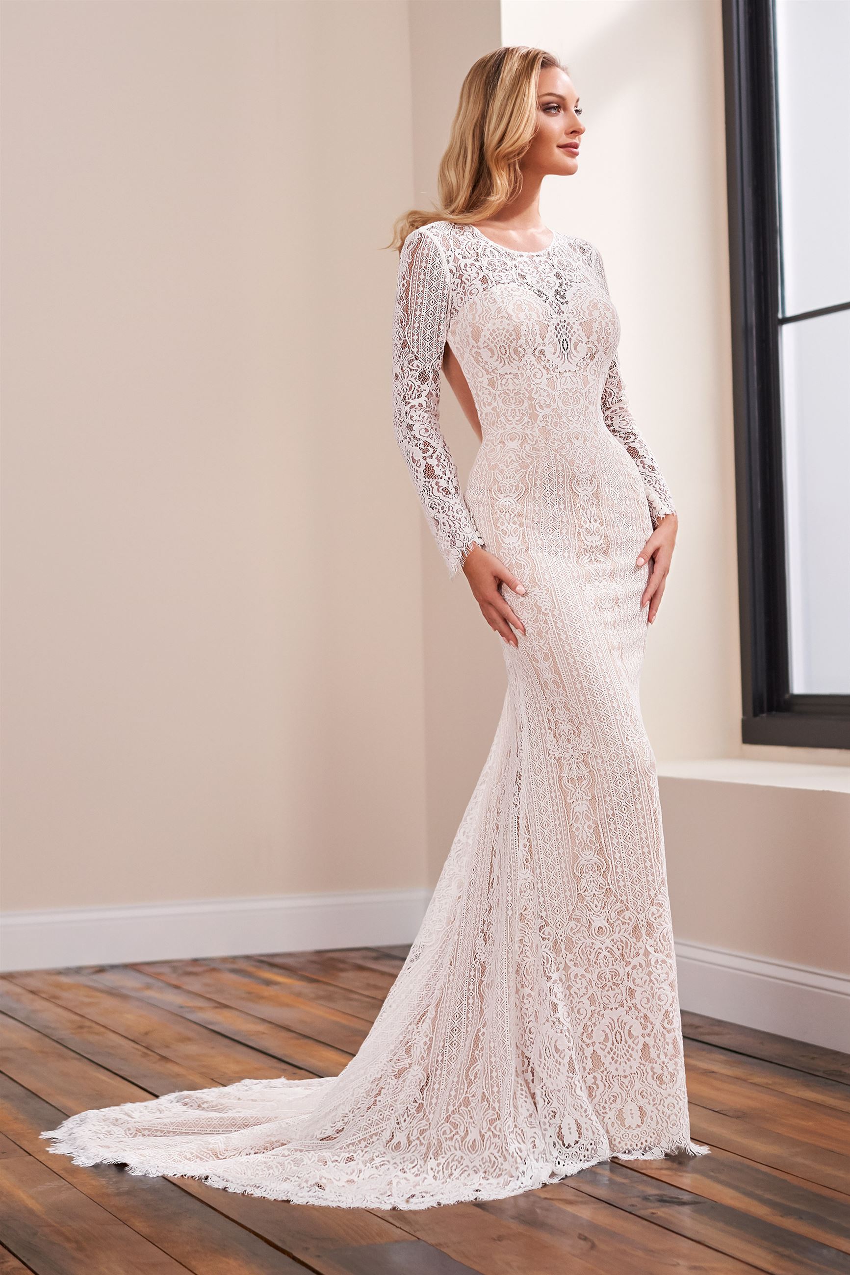Lace fit and flare bridal gown with bold, open back and illusion lace Style No. 221152 $1 autoplay loop mute thumbnail