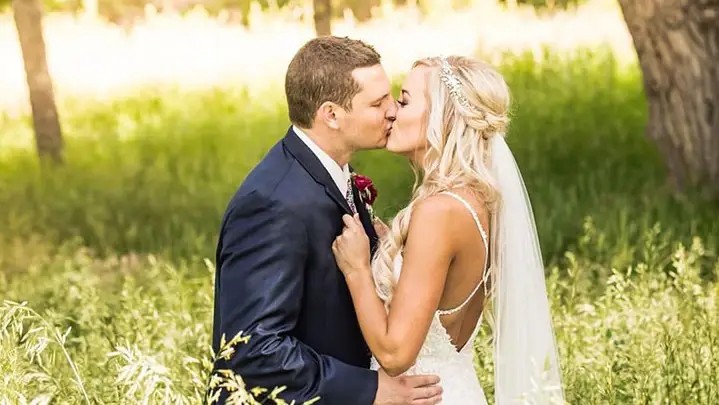 Stunning Summer Bride In Enchanting by Mon Cheri Lace Spaghetti Strap Gown Mobile Image