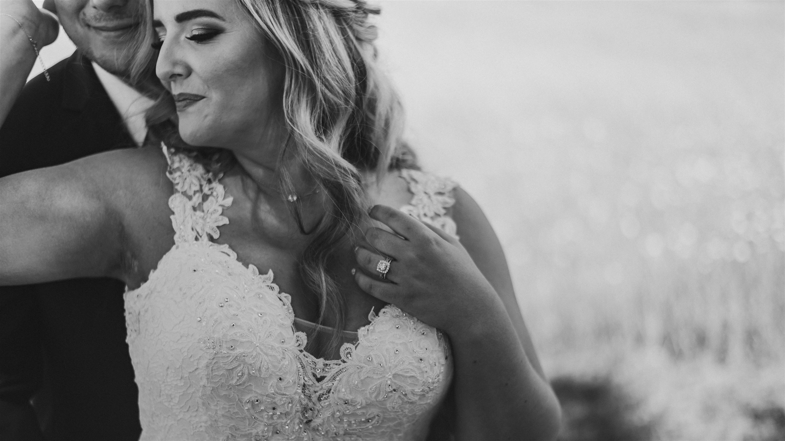 Bride and groom hugging each other