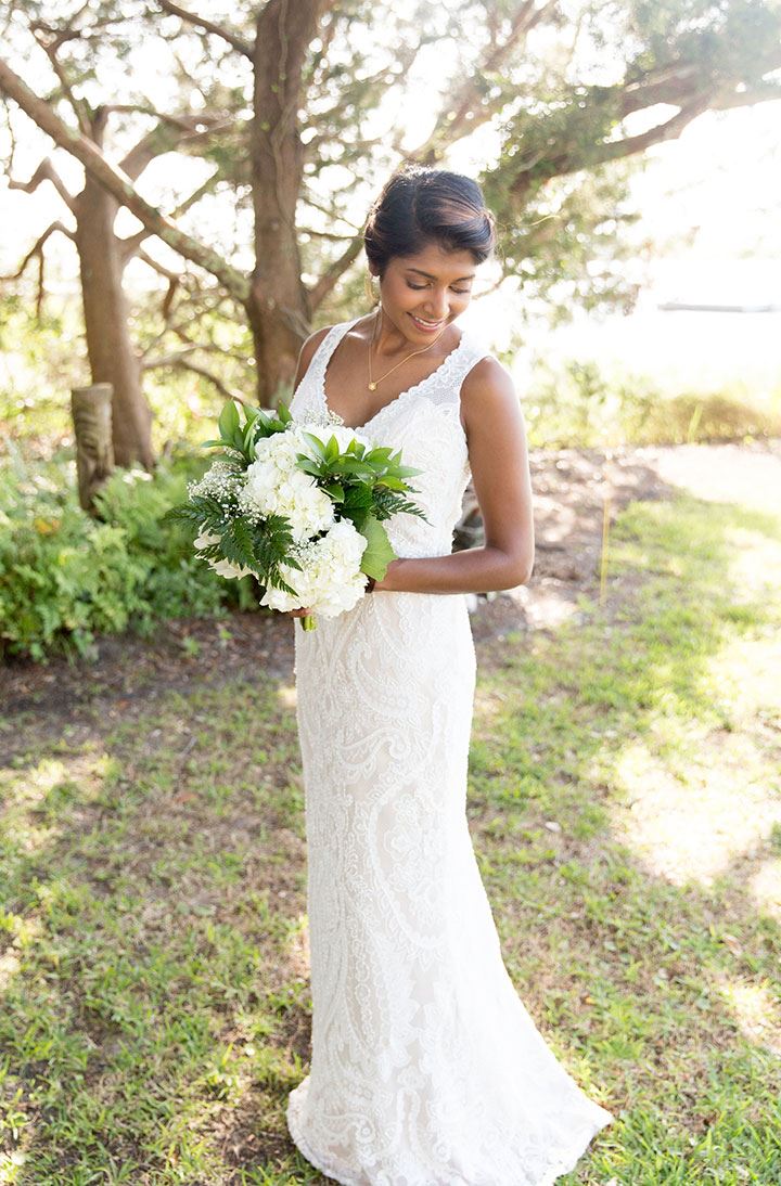 Bride holding her bouquet outside